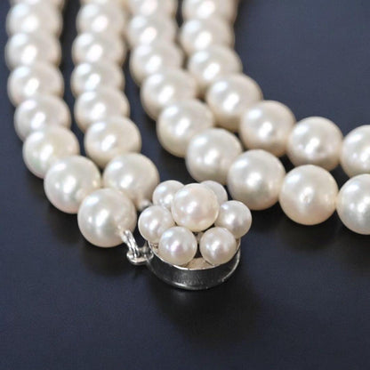Double strand Tasaki Akoya pearl necklace with round 6.1-6.3 mm pearls and silver clasp