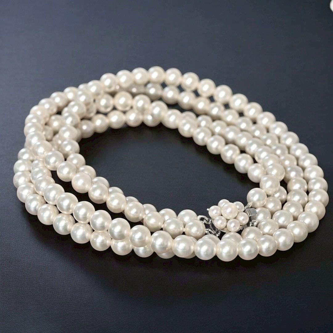 Double strand Tasaki Akoya pearl necklace with round 6.1-6.3 mm pearls and silver clasp