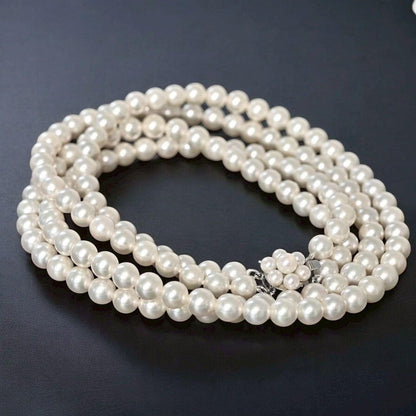 Double strand Tasaki Akoya pearl necklace with round 6.1-6.3 mm pearls and silver clasp