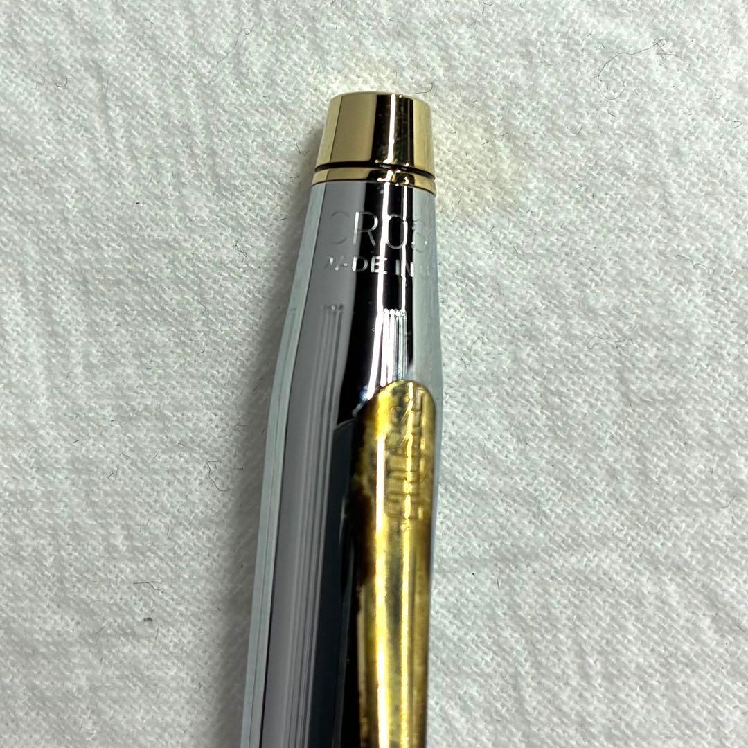 Silver CROSS ballpoint pen with dedicated case and replacement ink on a white background