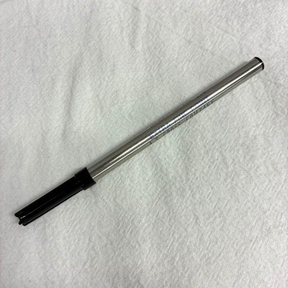Silver CROSS ballpoint pen with dedicated case and replacement ink on a white background