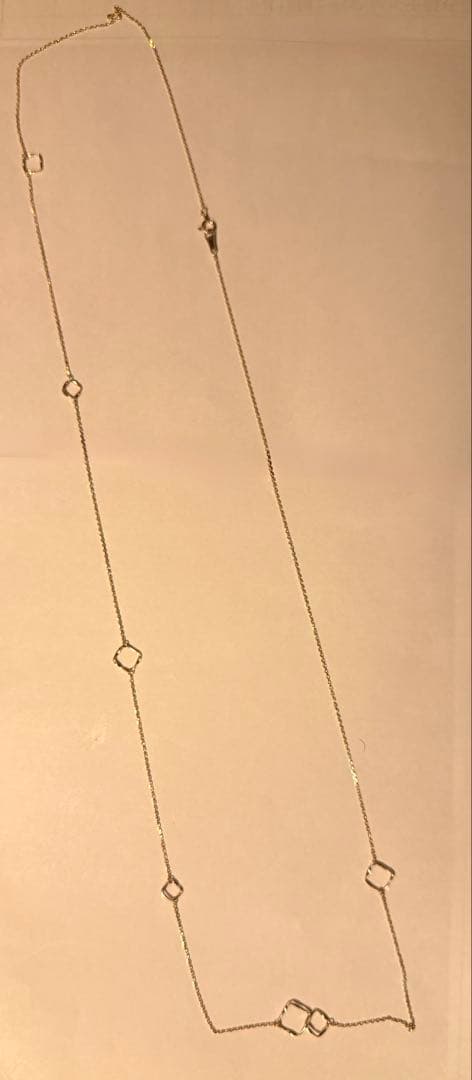 Agete K10YG long necklace in yellow gold with 80cm length displayed on a white background