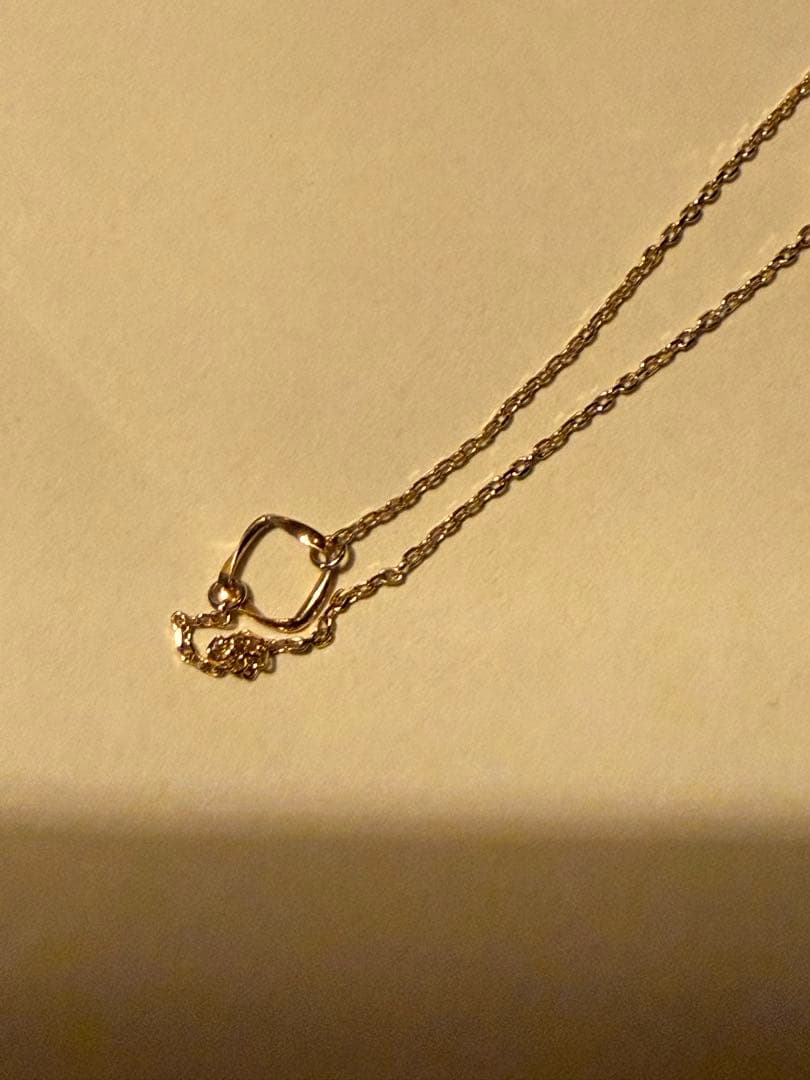 Agete K10YG long necklace in yellow gold with 80cm length displayed on a white background