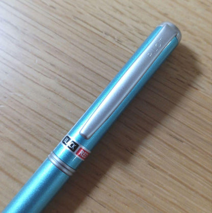 Pilot BKT-1SR-SL rotating 2-color ballpoint pen with oil-based ink in light blue barrel featuring black and red fine tips
