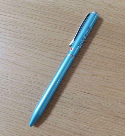 Pilot BKT-1SR-SL rotating 2-color ballpoint pen with oil-based ink in light blue barrel featuring black and red fine tips
