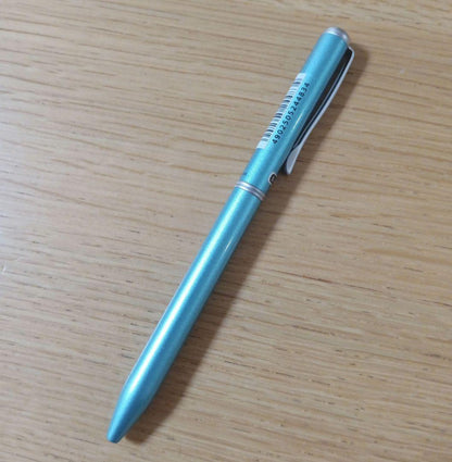 Pilot BKT-1SR-SL rotating 2-color ballpoint pen with oil-based ink in light blue barrel featuring black and red fine tips