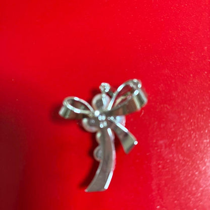 MIKIMOT Pearl Ribbon Pendant Top with silver-colored metal ribbon and pearl decoration