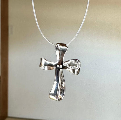 MIKIMOTO silver cross pendant top with 4.5mm Akoya pearl on a white background