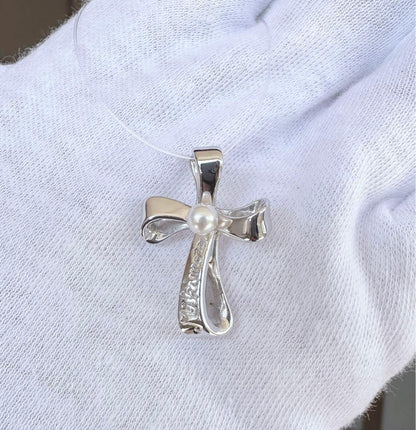 MIKIMOTO silver cross pendant top with 4.5mm Akoya pearl on a white background