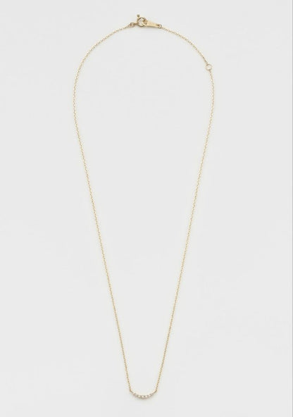Nika K10 gold necklace with diamond pendant and spring ring clasp on a white background