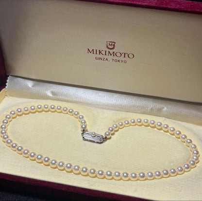 Mikimoto Akoya pearl necklace with 5.5 to 5.9mm pearls, 38cm length, silver clasp, displayed with genuine case