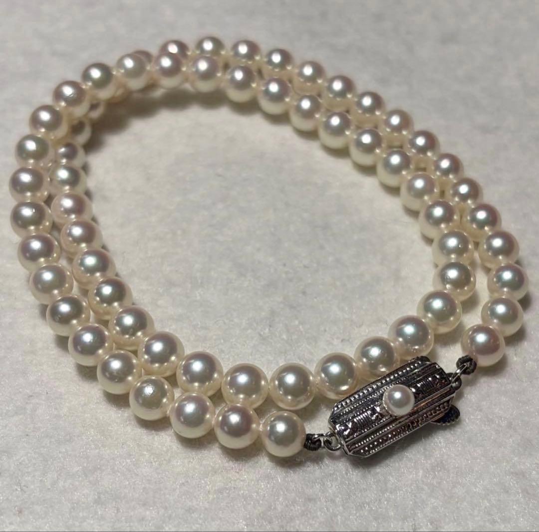 Mikimoto Akoya pearl necklace with 5.5 to 5.9mm pearls, 38cm length, silver clasp, displayed with genuine case