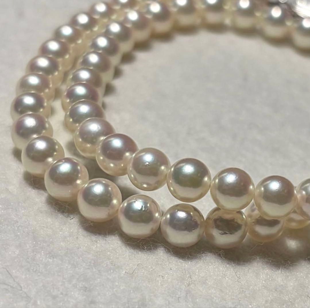 Mikimoto Akoya pearl necklace with 5.5 to 5.9mm pearls, 38cm length, silver clasp, displayed with genuine case