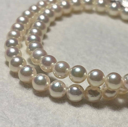 Mikimoto Akoya pearl necklace with 5.5 to 5.9mm pearls, 38cm length, silver clasp, displayed with genuine case