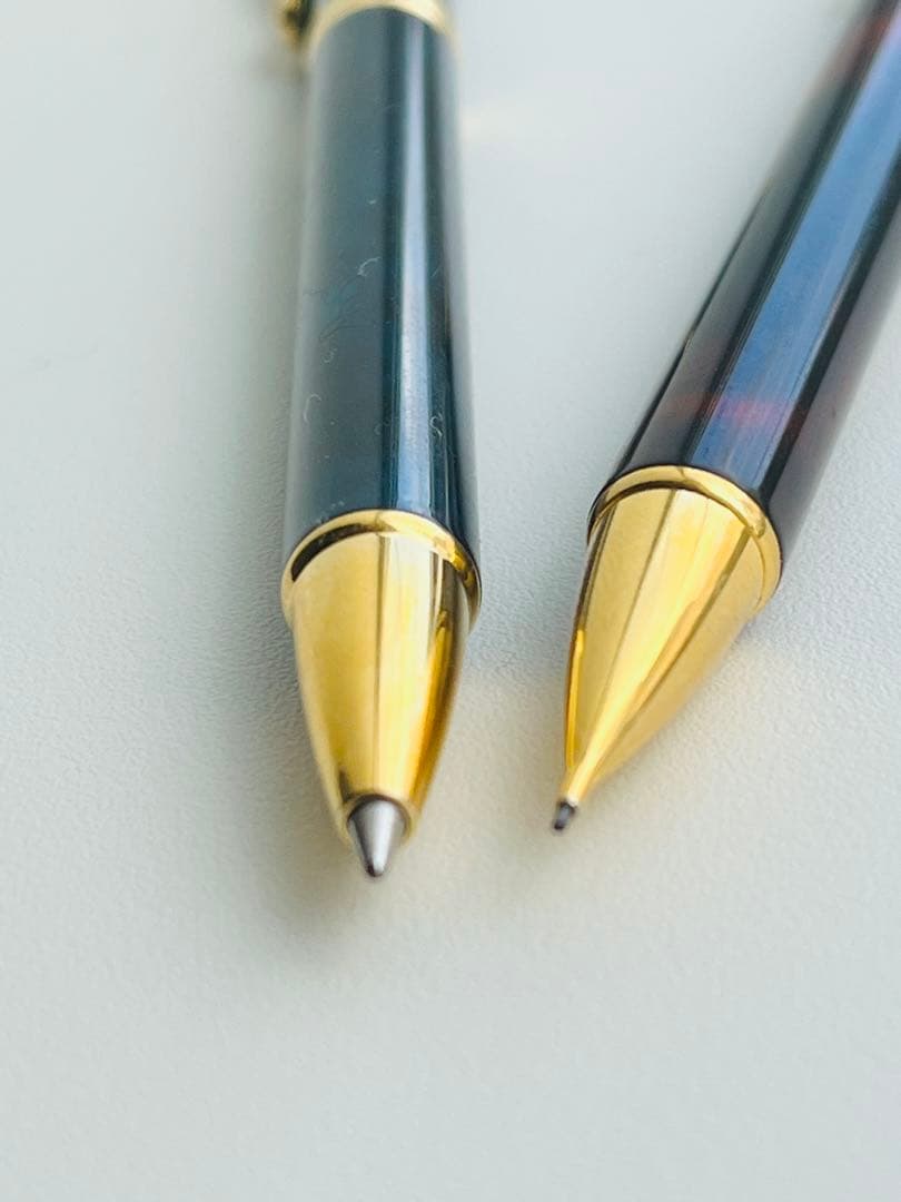 Set of two Pilot Cavalier first generation writing instruments mechanical pencil red marble and blue marble ballpoint pen