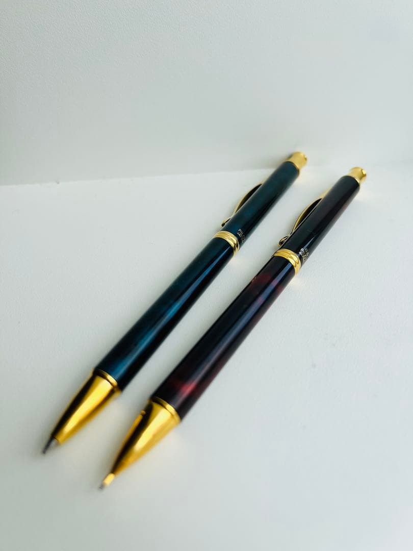Set of two Pilot Cavalier first generation writing instruments mechanical pencil red marble and blue marble ballpoint pen