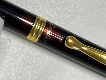 Set of two Pilot Cavalier first generation writing instruments mechanical pencil red marble and blue marble ballpoint pen
