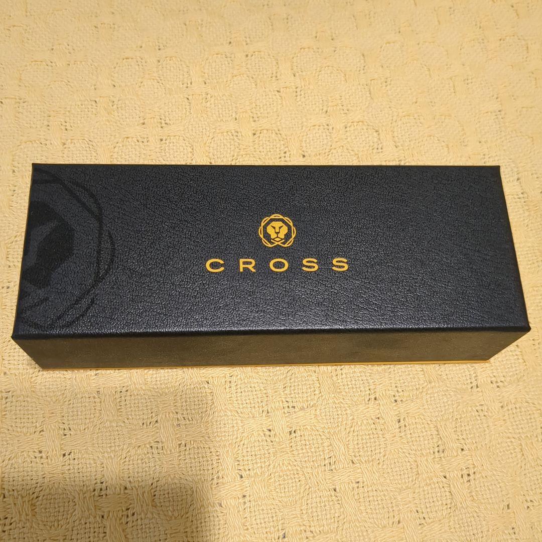 CROSS black metal ballpoint pen with slim design displayed next to a black gift box
