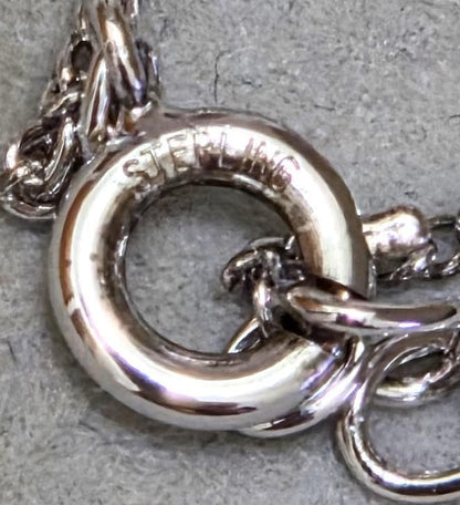 Tasaki Akoya pearl necklace in silver with 42.5cm length displayed with its box