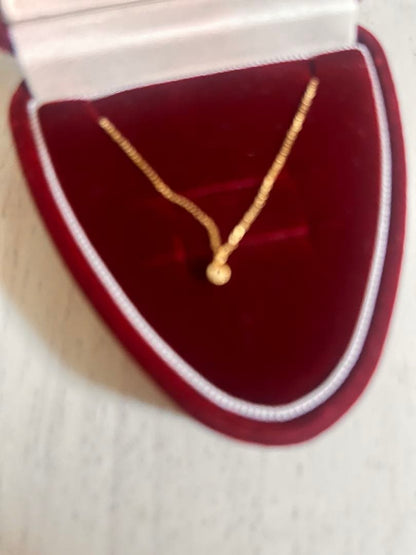 Agete K18 gold necklace with diamond pendant on a white background showing 40 cm length