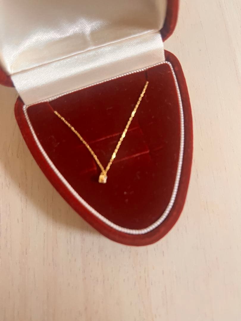 Agete K18 gold necklace with diamond pendant on a white background showing 40 cm length