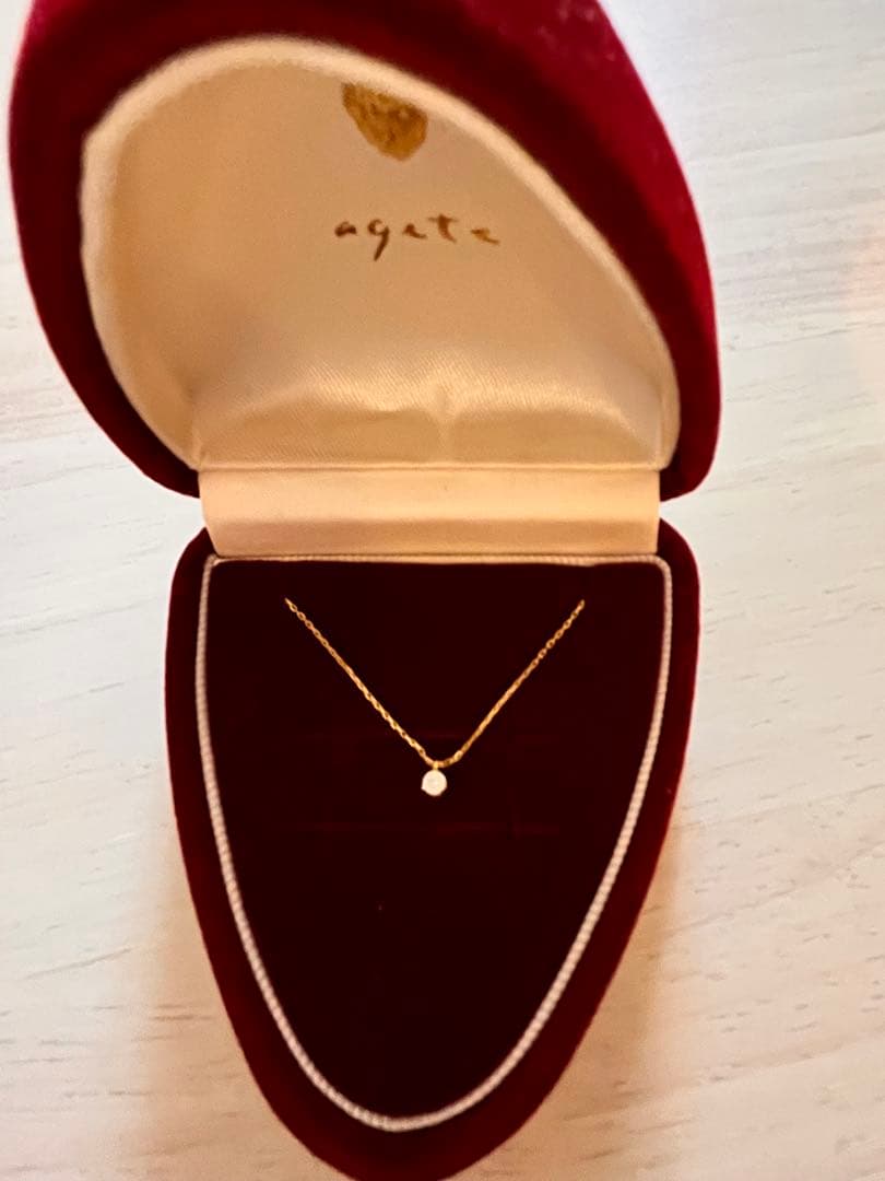 Agete K18 gold necklace with diamond pendant on a white background showing 40 cm length