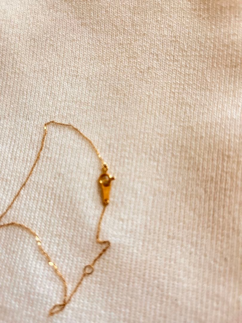 Agete K18 gold necklace with diamond pendant on a white background showing 40 cm length