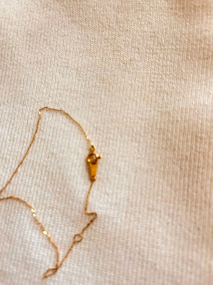 Agete K18 gold necklace with diamond pendant on a white background showing 40 cm length