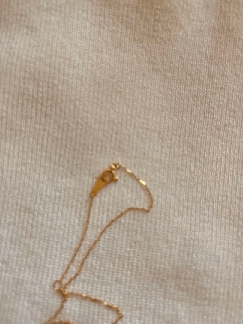 Agete K18 gold necklace with diamond pendant on a white background showing 40 cm length