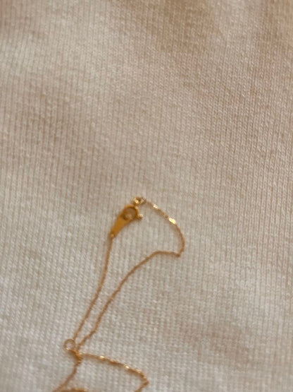 Agete K18 gold necklace with diamond pendant on a white background showing 40 cm length