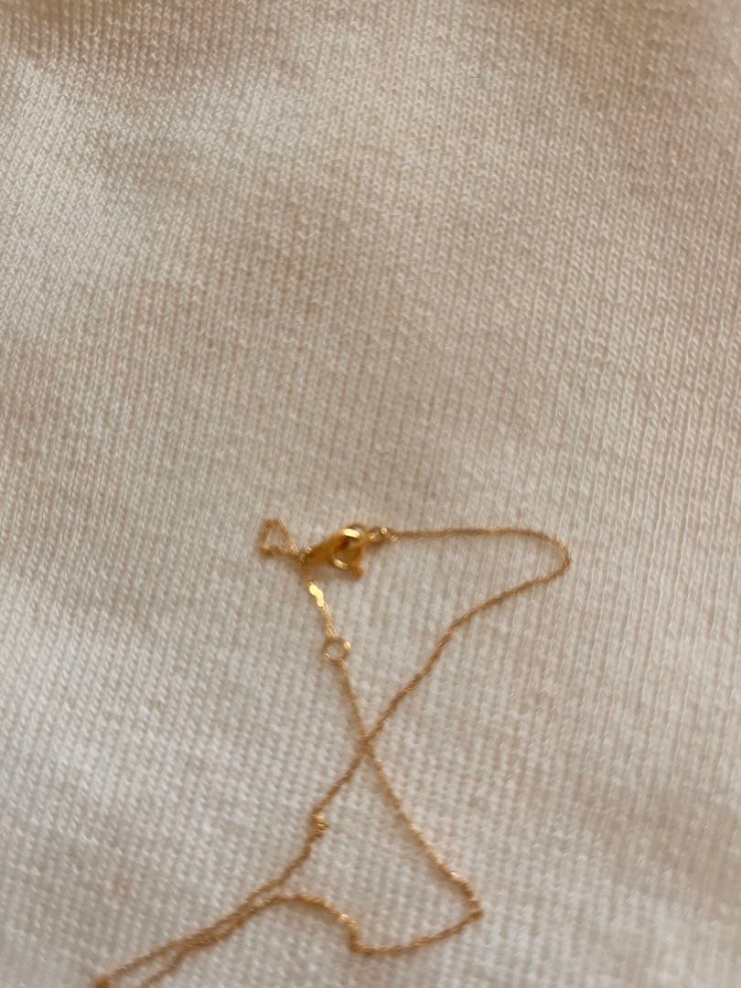 Agete K18 gold necklace with diamond pendant on a white background showing 40 cm length