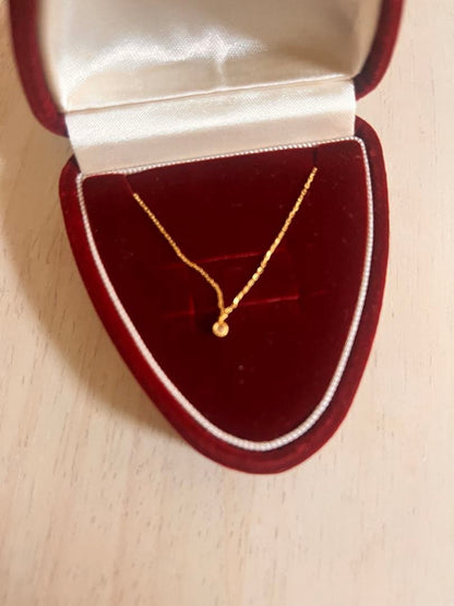 Agete K18 gold necklace with diamond pendant on a white background showing 40 cm length