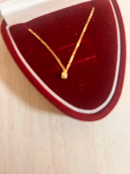 Agete K18 gold necklace with diamond pendant on a white background showing 40 cm length