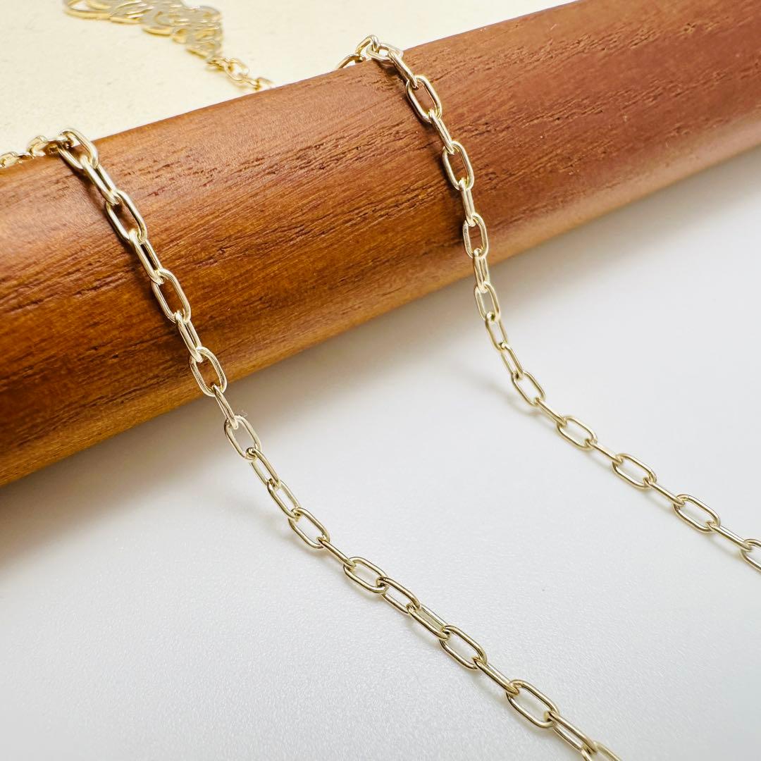 Agete Transparent Plate Necklace in silver material with gold color, 2.6 cm top length on 50 cm chain