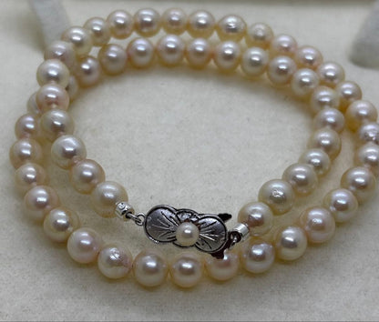 Akoya pearl necklace featuring 6.5-7mm pearls with approximately 41 centimeters length
