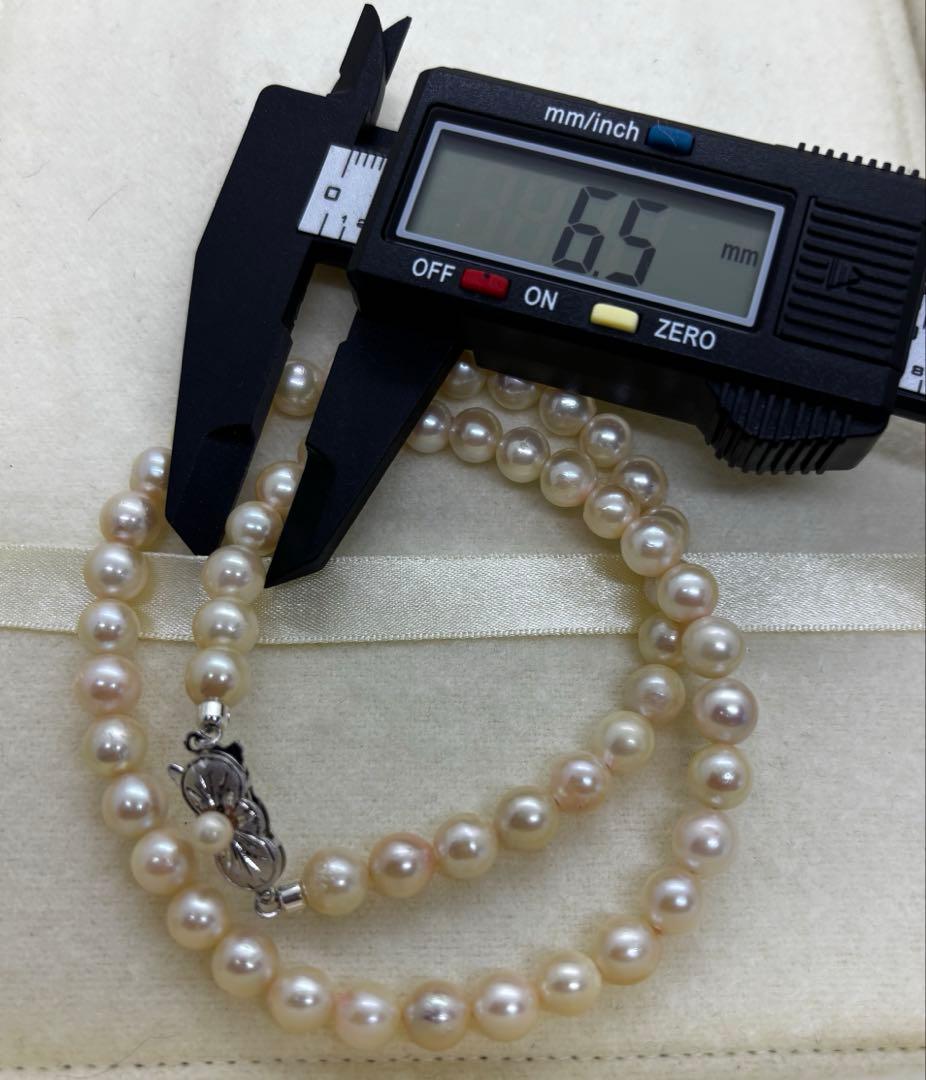 Akoya pearl necklace featuring 6.5-7mm pearls with approximately 41 centimeters length