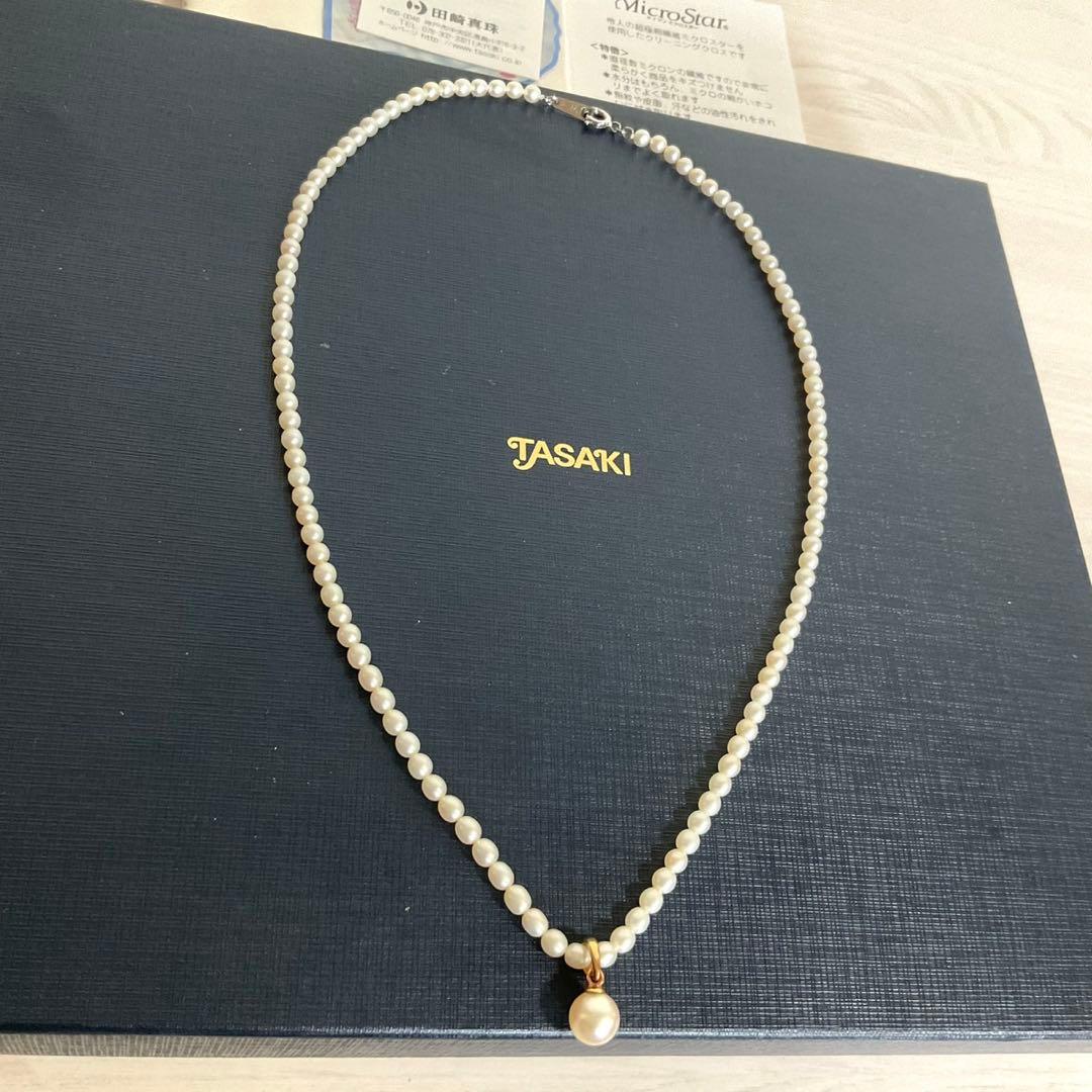 TASAKI baby pearl necklace with K18 gold pendant and Akoya pearls displayed with original box
