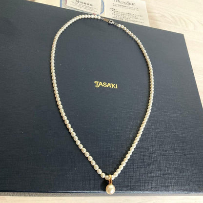 TASAKI baby pearl necklace with K18 gold pendant and Akoya pearls displayed with original box