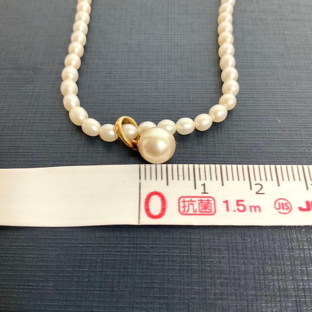 TASAKI baby pearl necklace with K18 gold pendant and Akoya pearls displayed with original box