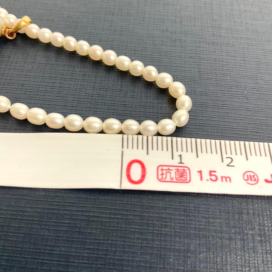 TASAKI baby pearl necklace with K18 gold pendant and Akoya pearls displayed with original box