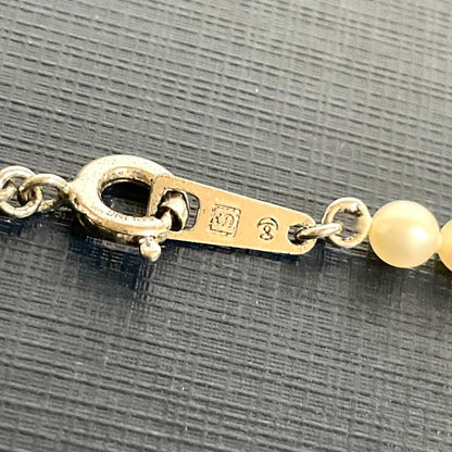 TASAKI baby pearl necklace with K18 gold pendant and Akoya pearls displayed with original box