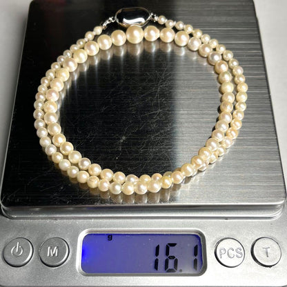 Akoya pearl necklace with silver clasp featuring 3.1-7.5mm pearls, 46cm length