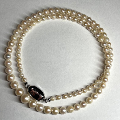 Akoya pearl necklace with silver clasp featuring 3.1-7.5mm pearls, 46cm length