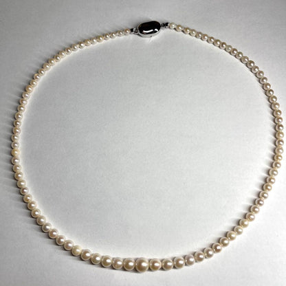 Akoya pearl necklace with silver clasp featuring 3.1-7.5mm pearls, 46cm length