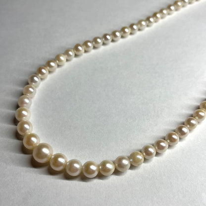 Akoya pearl necklace with silver clasp featuring 3.1-7.5mm pearls, 46cm length