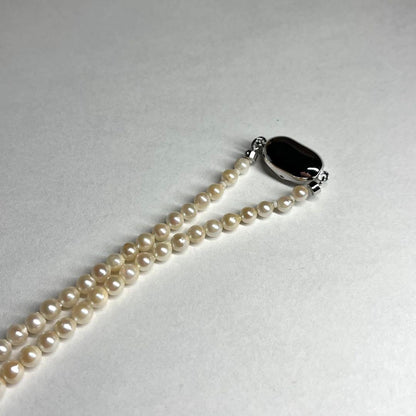 Akoya pearl necklace with silver clasp featuring 3.1-7.5mm pearls, 46cm length