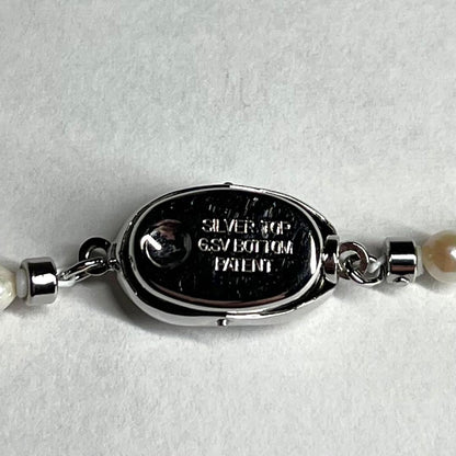 Akoya pearl necklace with silver clasp featuring 3.1-7.5mm pearls, 46cm length