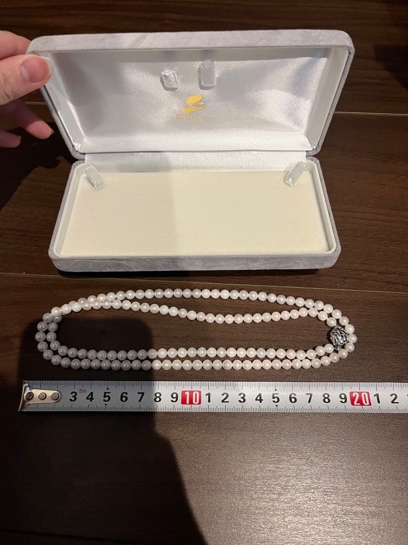 Takayama Akoya pearl necklace with 5mm white pearls and silver clasp displayed with a dedicated case
