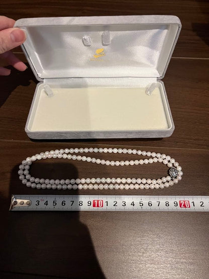 Takayama Akoya pearl necklace with 5mm white pearls and silver clasp displayed with a dedicated case