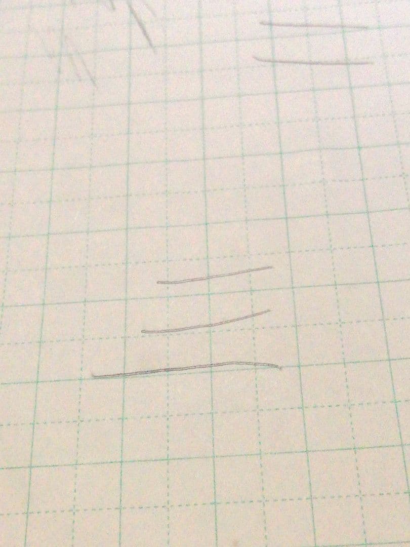 CROSS slim ballpoint pen in chic wine red color writing on paper